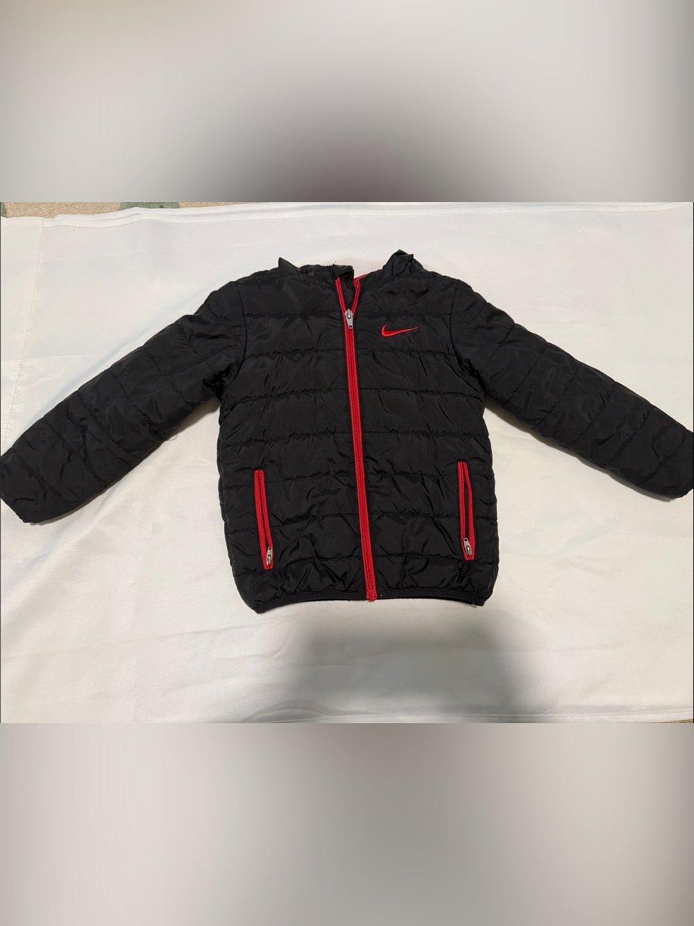 Nike Kids Black Puffer Jacket with Red Zippers